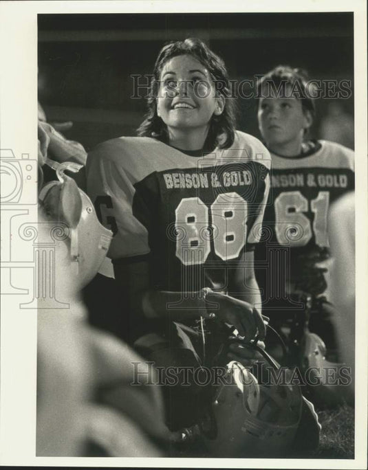 1984 Press Photo Football - Michele McCoy listens to instruction prior to game- Historic Images