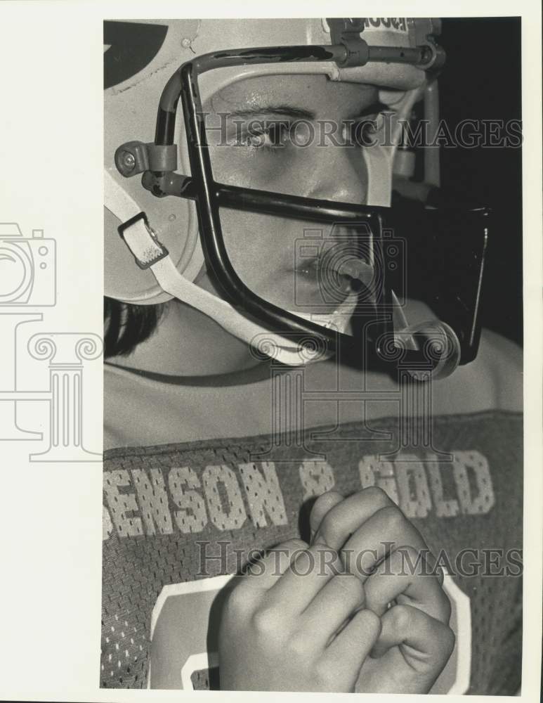 1984 Press Photo Football - Michele McCoy suits up for the game while chatting- Historic Images