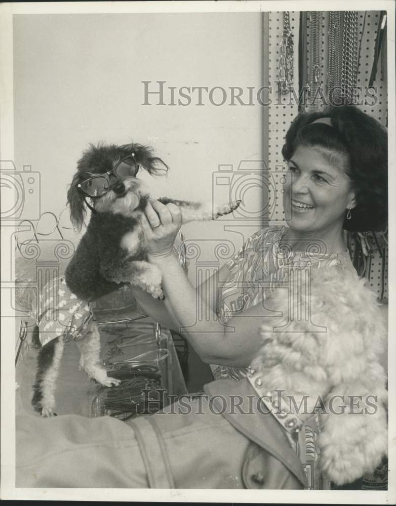 1966 Press Photo Pet shop proprietress Mrs. Evelyn McLaughlin holds dog &quot;Pierre&quot;