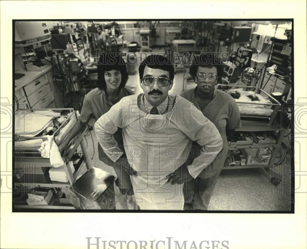 Press Photo Ovidio Fernandez with nurses who helped found Wee Care for daughter