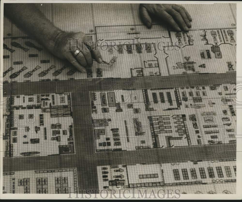 1962 Press Photo A pen knife used on the gribbled plastic sheet plant layout- Historic Images