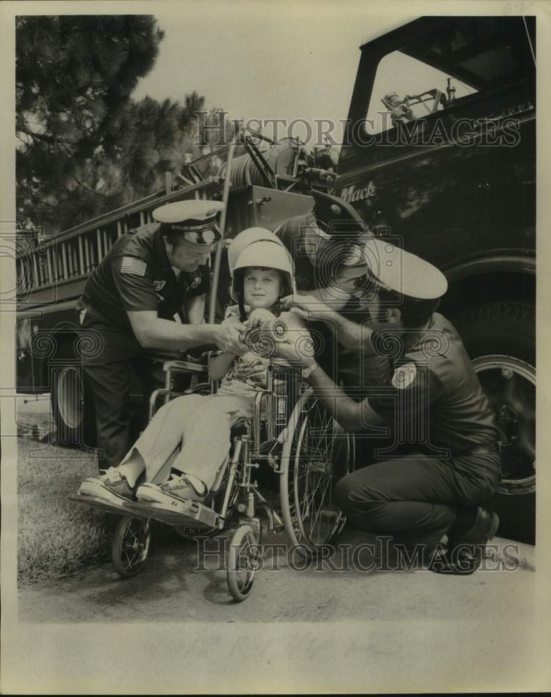 1976 Press Photo Firefighters with Muscular Dystrophy poster child Pat Cypert- Historic Images