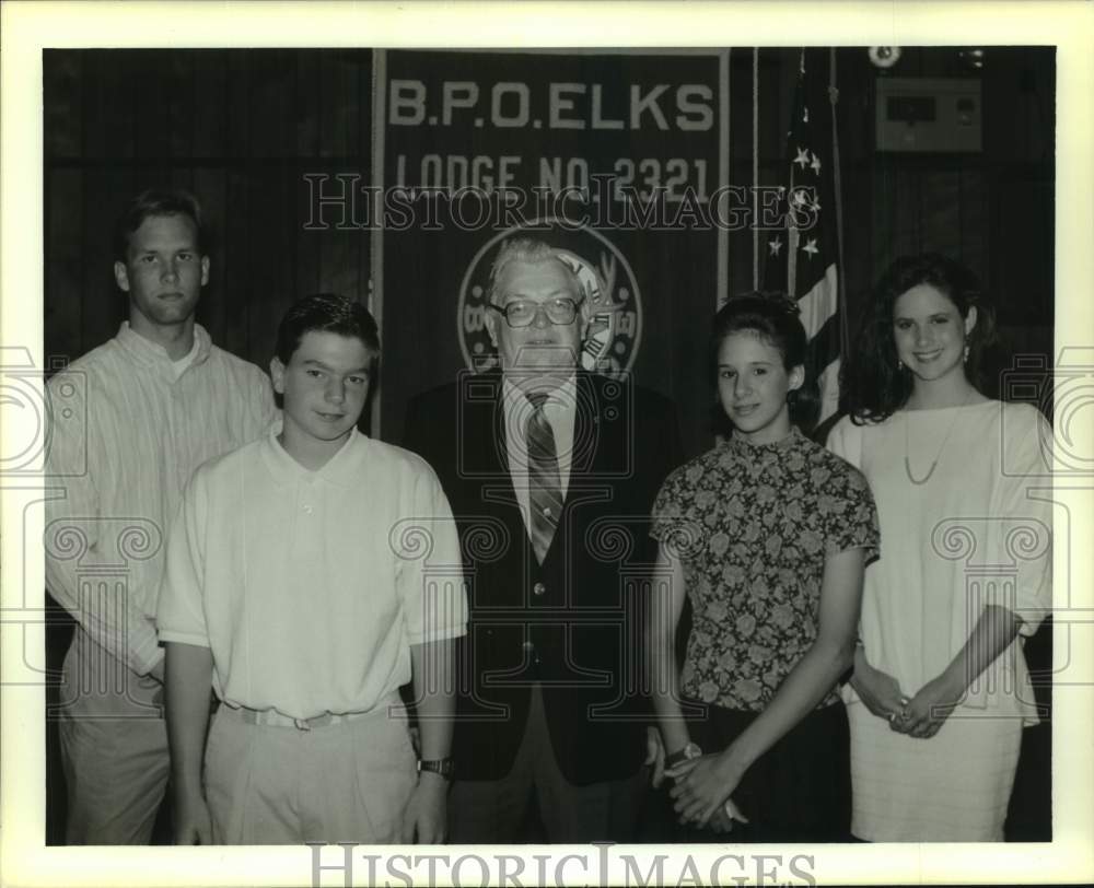 1990 Press Photo Art Mousteiko, exalted ruler of Elks Lodge No. 2321, And Teens- Historic Images