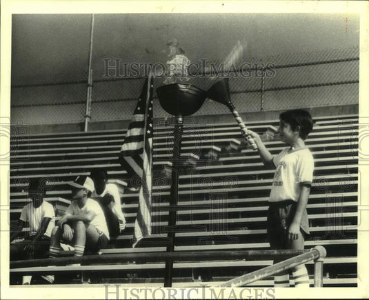 1982 Press Photo Joseph Meese lights torch to begin the "Alexander Olympics"- Historic Images
