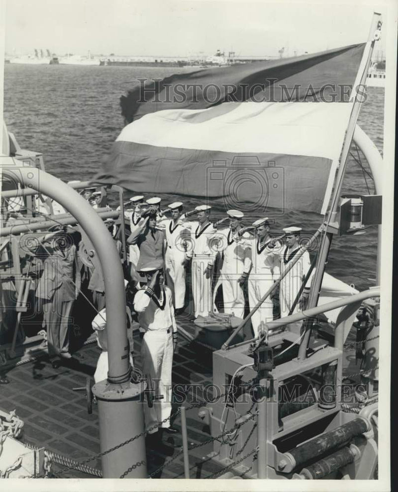 Load image into Gallery viewer, 1953 Press Photo Crew members of HMNS Borculo salute the Netherlands flag
