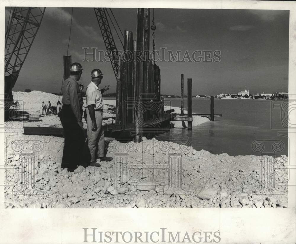 1966 Press Photo Contractors Watch Piles Being Driven To Support New Bridge- Historic Images