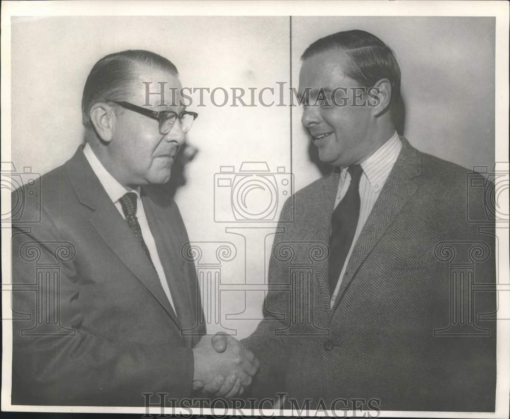 1970 Press Photo Harry Souchou Shakes Hands With James Nassikas - nob93247- Historic Images
