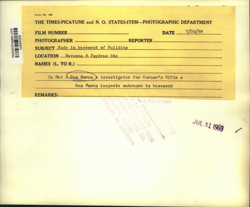 Load image into Gallery viewer, 1969 Press Photo Sam Moran, investigator for Coroner's Office, inspects basement

