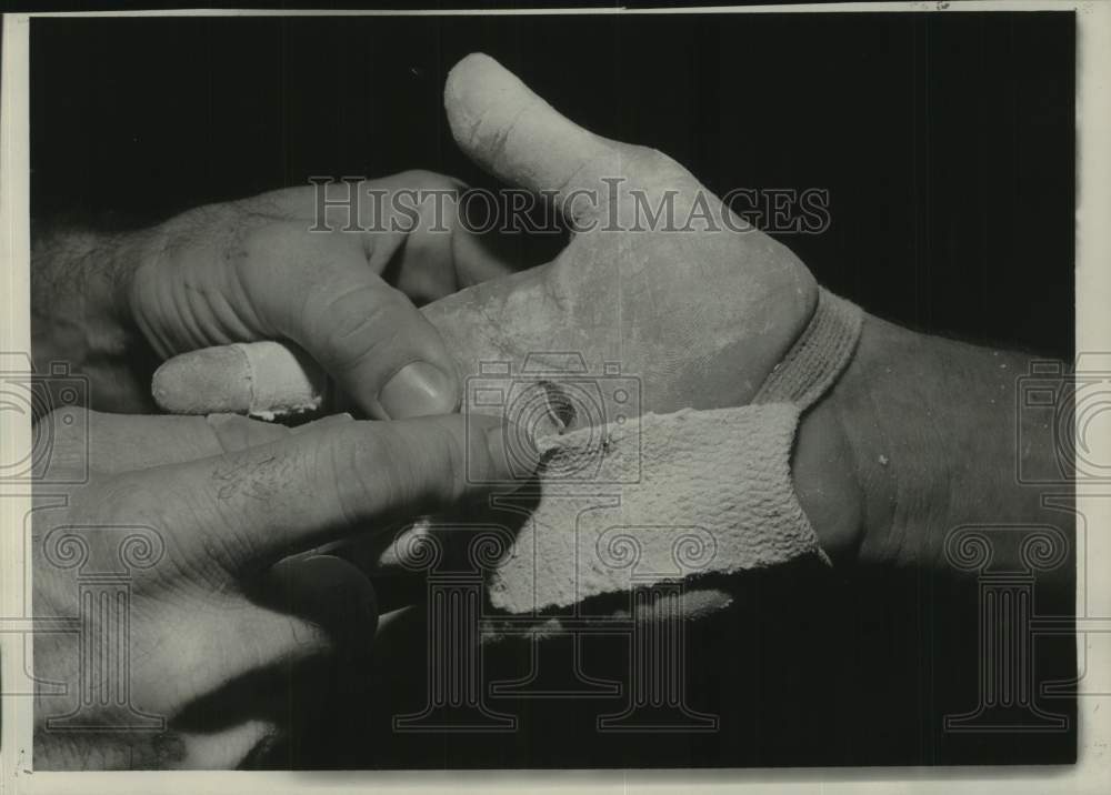 1963 Press Photo Hand of a gymnast with guards and magnesium chalk - nob94380- Historic Images