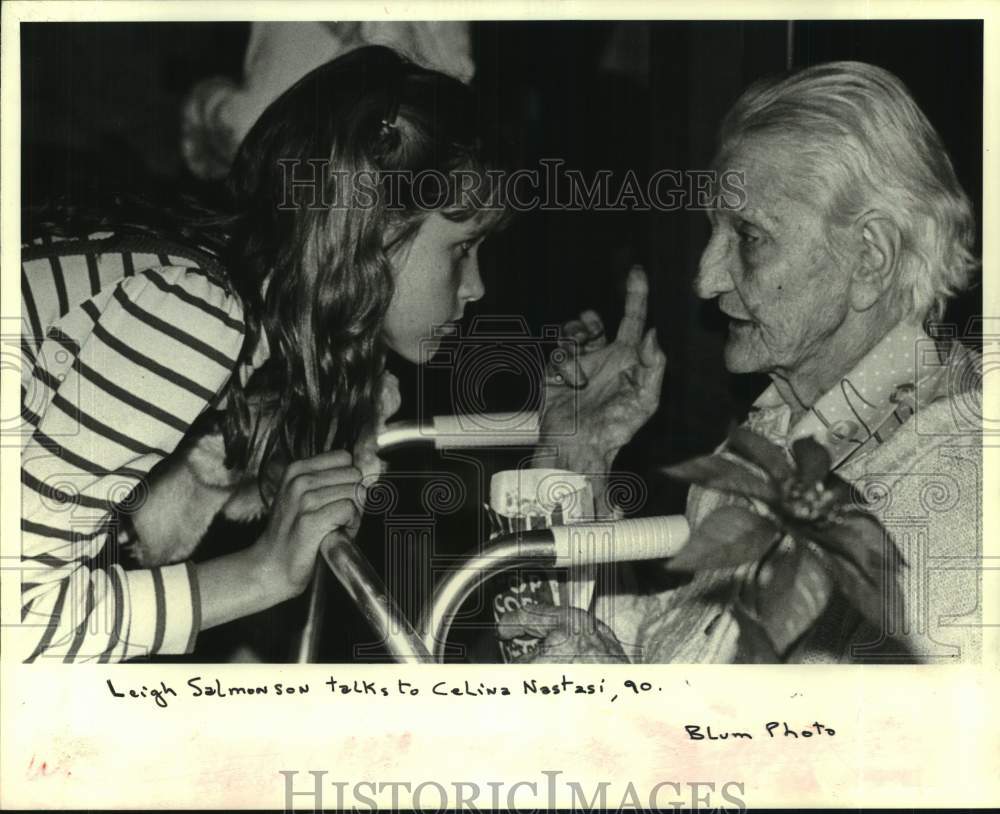 1983 Press Photo Leigh Salmonson listens to 90-year-old Celina Nastasi