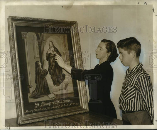 1958 Press Photo Irma Messmer, Son Lloyd Inspect Religious Needlepoint Artwork