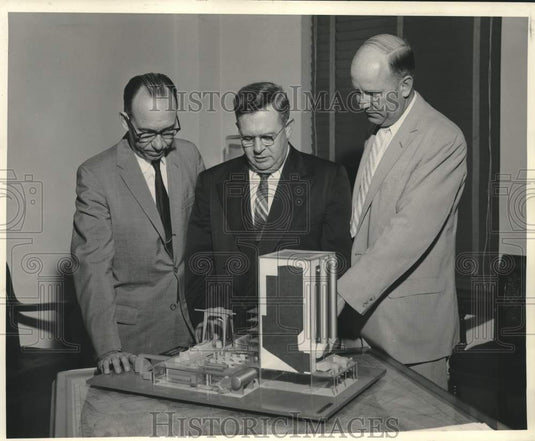 1958 Press Photo Looking over model of Michoud Steam-Electric Generating Station