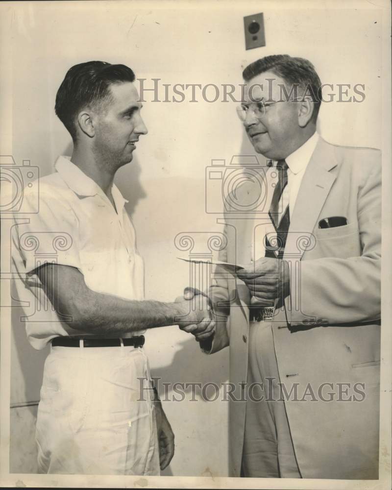 1954 Press Photo Hotel Dieu intern Dr. Albert Steiner awarded by Dr. A.L. Levine