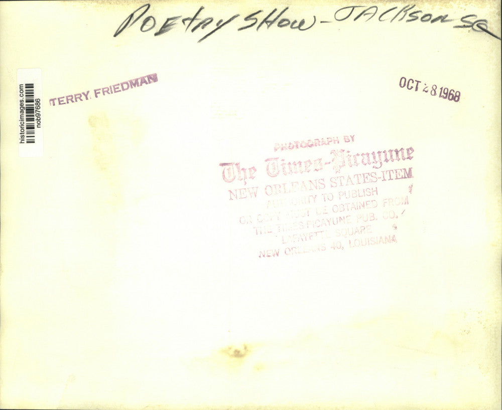 1968 Press Photo Visitors look at wall posters at Poetry Jackson Square Show