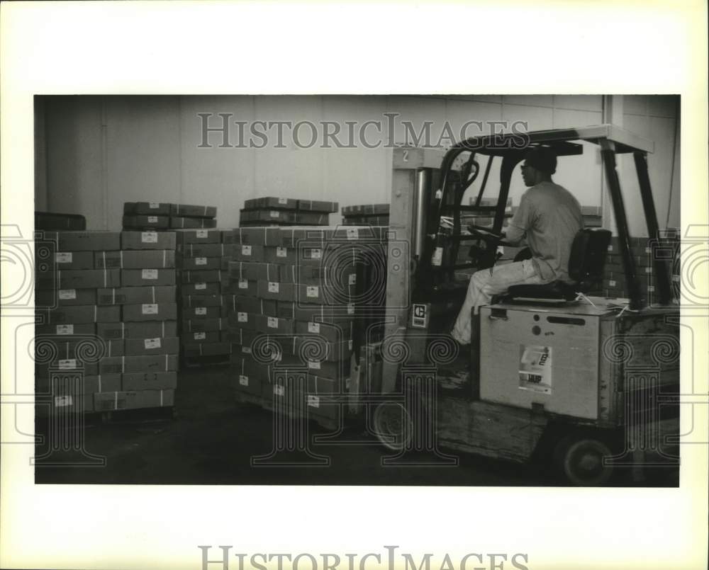 1994 Press Photo Man Uses Forklift To Move Inventory, New Orleans Cold Storage- Historic Images