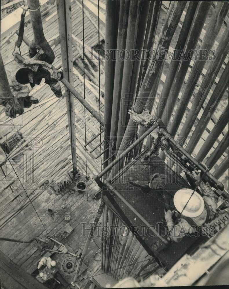 Load image into Gallery viewer, 1951 Press Photo Derrickman on Humble &amp; Oil Refining Company Oil Drilling Rig
