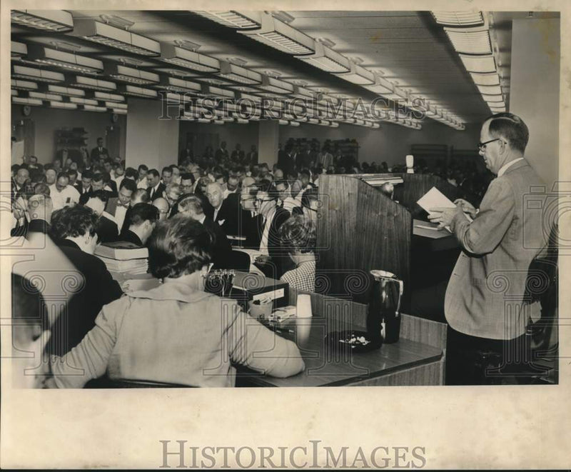 Load image into Gallery viewer, 1962 Press Photo John Rankin reads oil lease bids in Louisiana - noc00893

