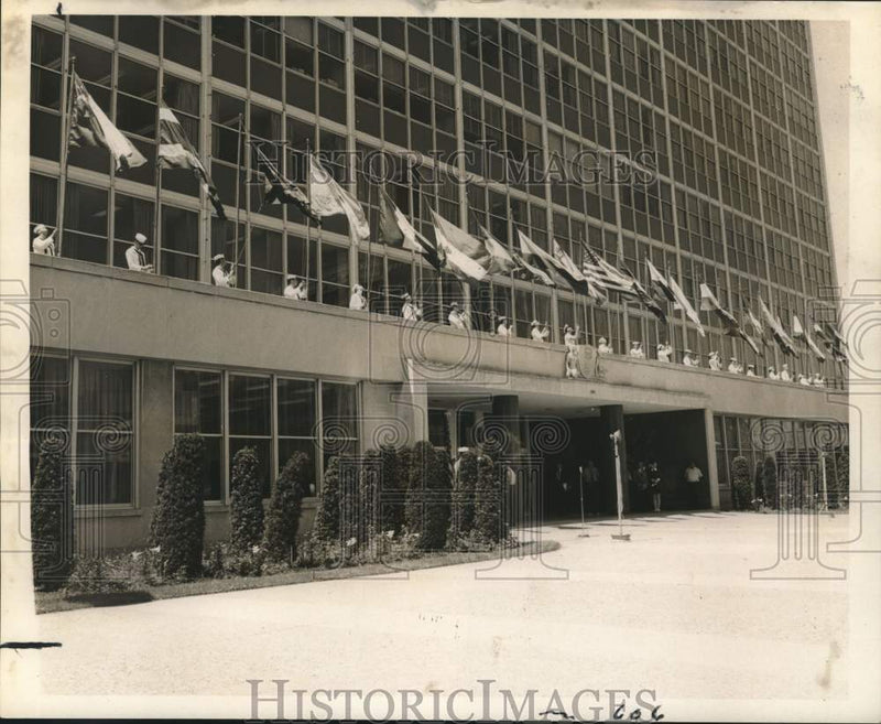 Load image into Gallery viewer, 1968 Press Photo Latin American Flags Raised by Sailors at New Orleans City Hall
