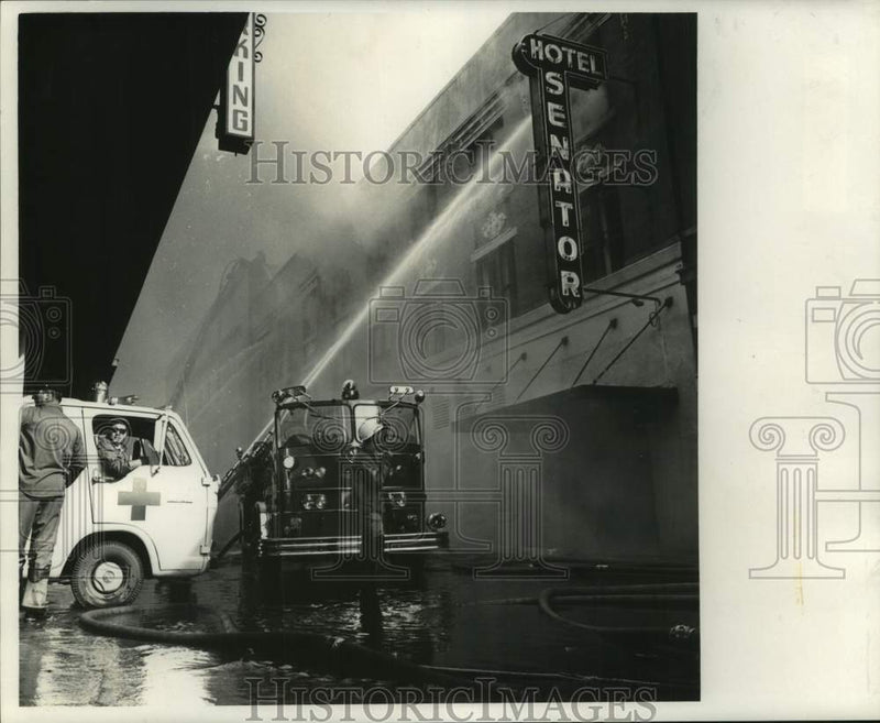 Load image into Gallery viewer, 1968 Press Photo Fire Watch on duty at Hotel Senator Fire- aiding firemen
