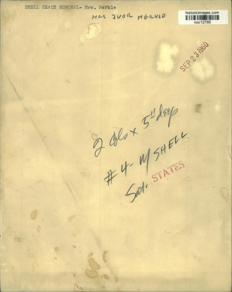 1960 Press Photo Mrs. Ivor Merle by her car in Shell Beach, Louisiana