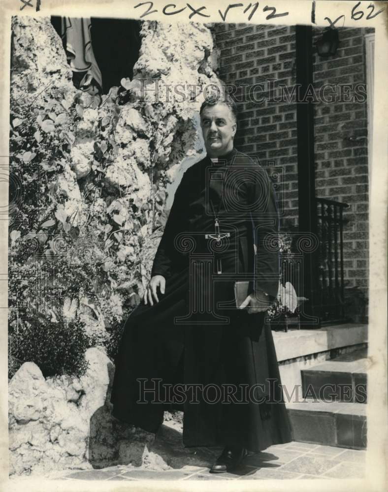 Load image into Gallery viewer, 1967 Press Photo Rev. Peter Rogers Stands by Shrine at Lady of Guadalupe Church
