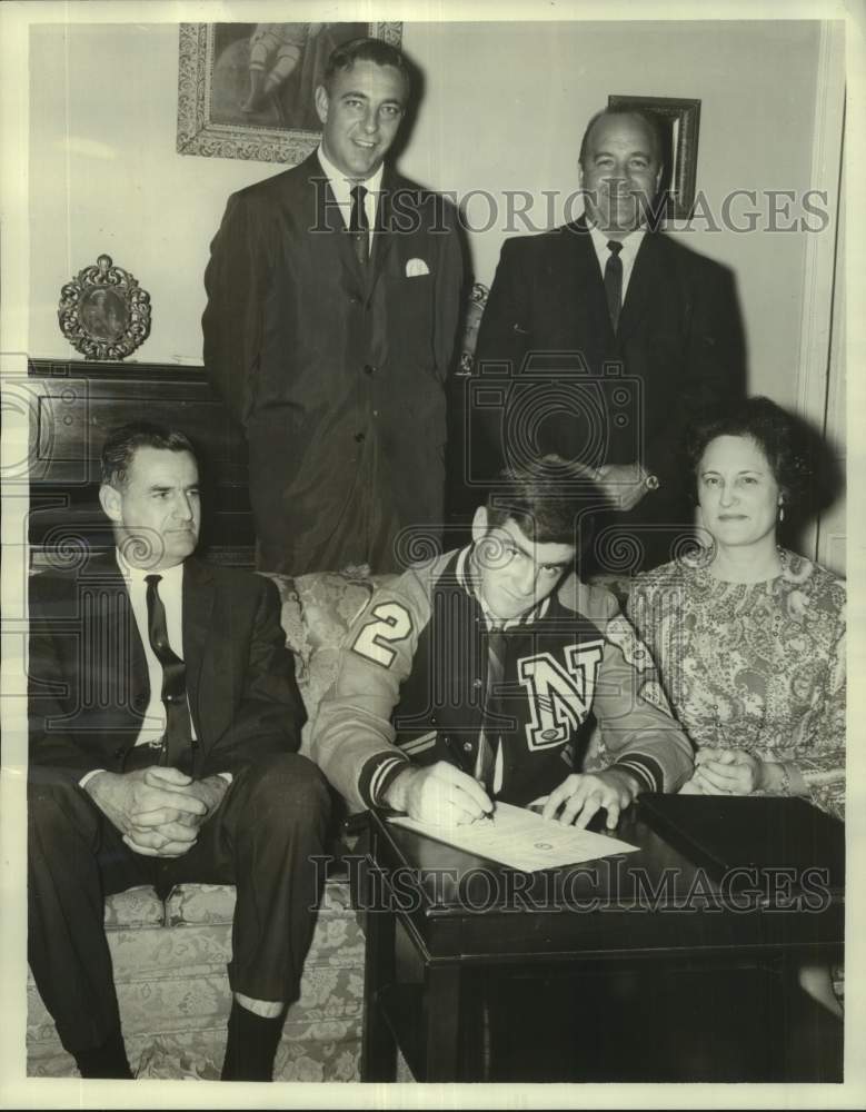 1967 Press Photo Halfback Johnny Prudhomme signs with Northwestern State- Historic Images