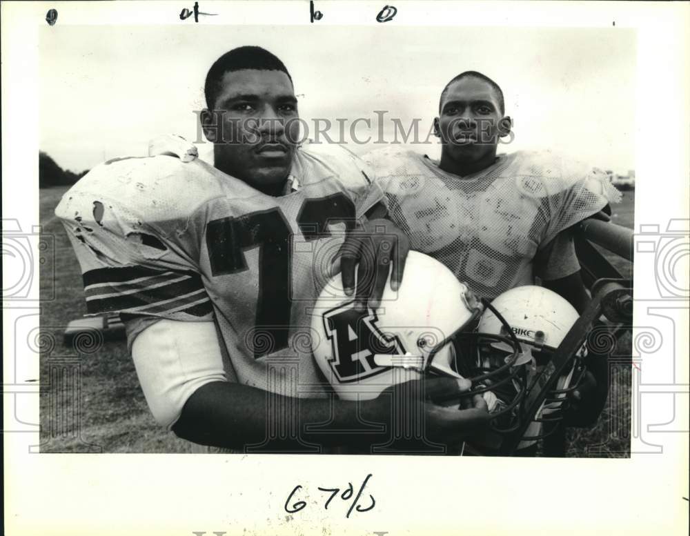 1990 Press Photo Abramson High School - Newman Rock, Addison Russ, Football- Historic Images