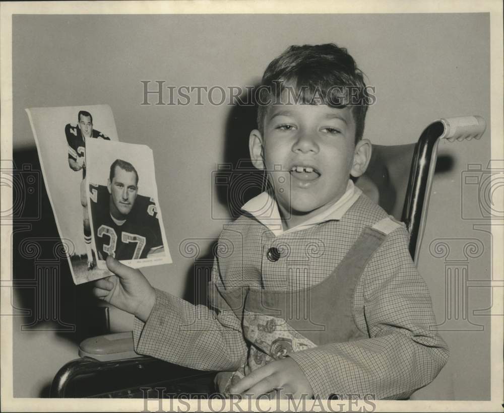 1968 Press Photo Rocky Rider with picture of Stonebreaker Football Player- Historic Images