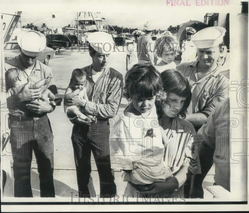 1969 Press Photo U.S. Coast Guardsmen carry Cuban Refugees in Miami, Florida- Historic Images