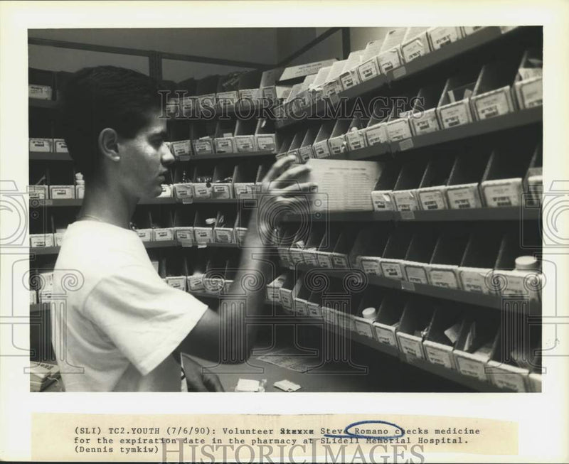Load image into Gallery viewer, 1990 Press Photo Volunteer Steve Romano at Pharmacy at Slidell Memorial Hospital
