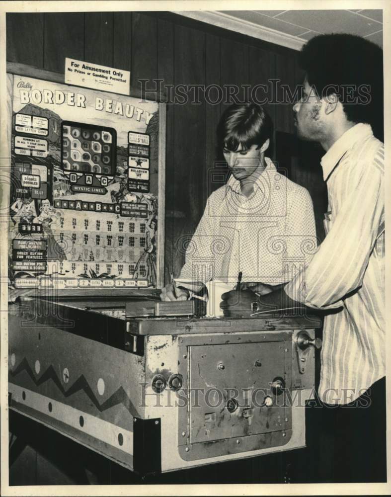 1972 Press Photo Men monitor pinball machine - noc24562- Historic Images