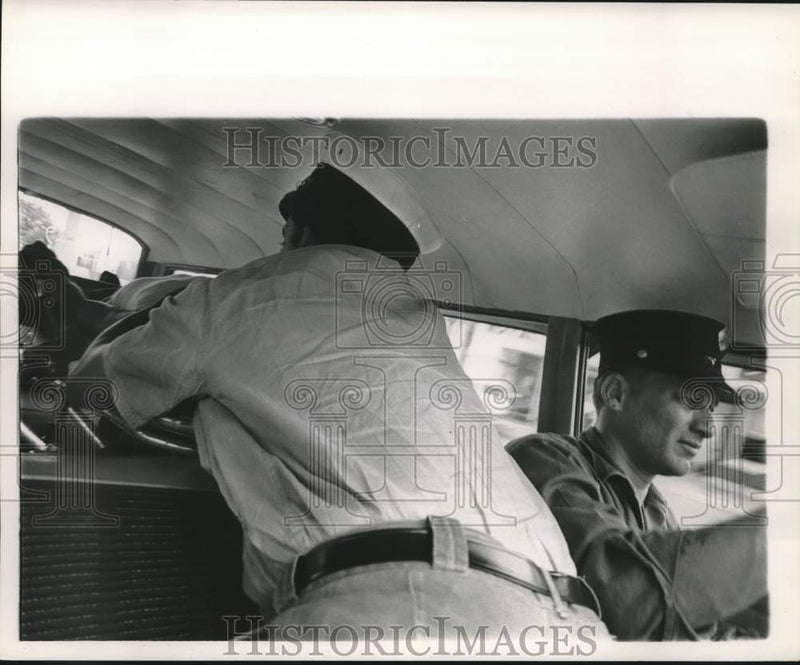 Load image into Gallery viewer, 1963 Press Photo New Orleans Fire Department Lt. Nuccio and driver with victim
