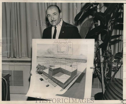 1962 Press Photo New Orleans Mayor Victor Schiro holds drawing of Delta hangar