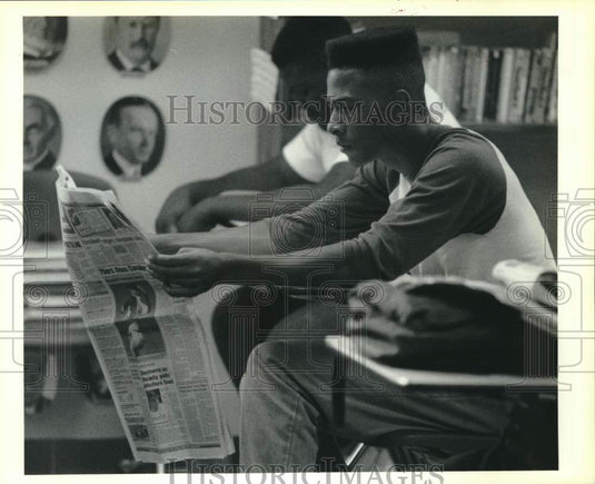 1990 Press Photo West St. John's Paul Brown reads sports during "quiet time."- Historic Images