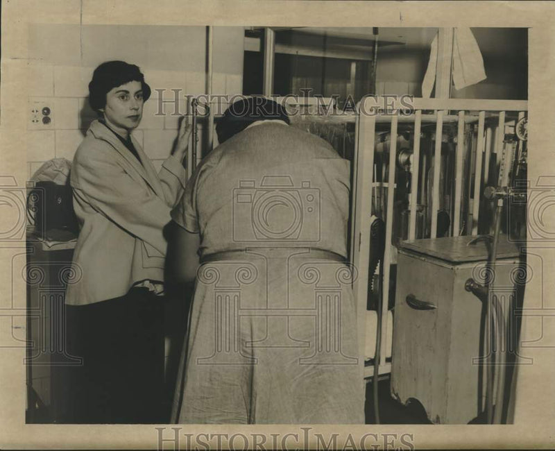 Load image into Gallery viewer, 1957 Press Photo Shelly Owen's mother &amp; nurse Celina Mack at Charity Hospital
