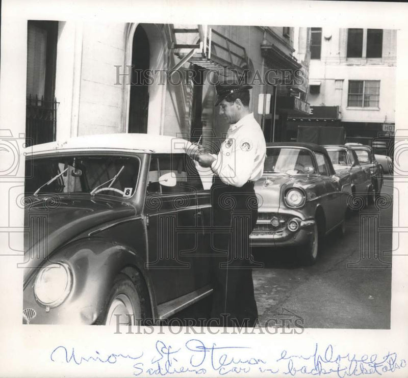 Load image into Gallery viewer, 1957 Press Photo Officer Frank Fortuna writes parking tickets on Union Street
