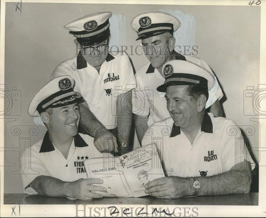 1966 Press Photo Officers of Lafitte Yacht Club look at pirogue races program