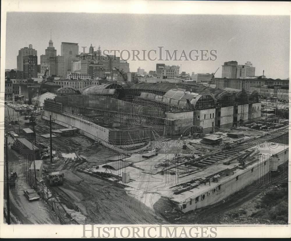 1966 Press Photo Rivergate convention facility construction on busy riverfront.