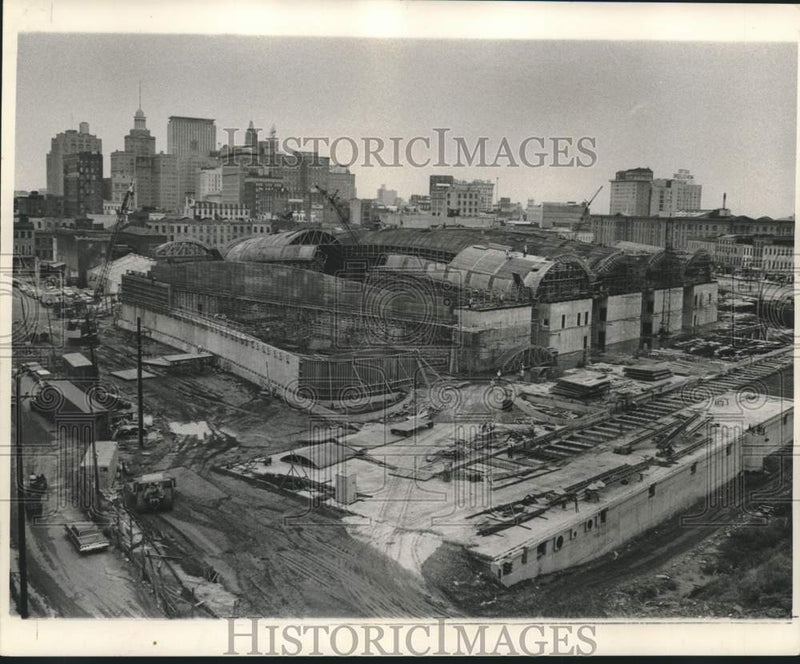 Load image into Gallery viewer, 1966 Press Photo Rivergate convention facility construction on busy riverfront.
