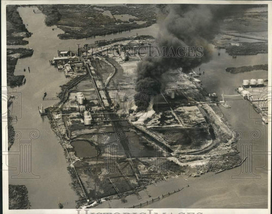 1964 Press Photo Fire damaged oil wells on Production Island at Dupre Cut