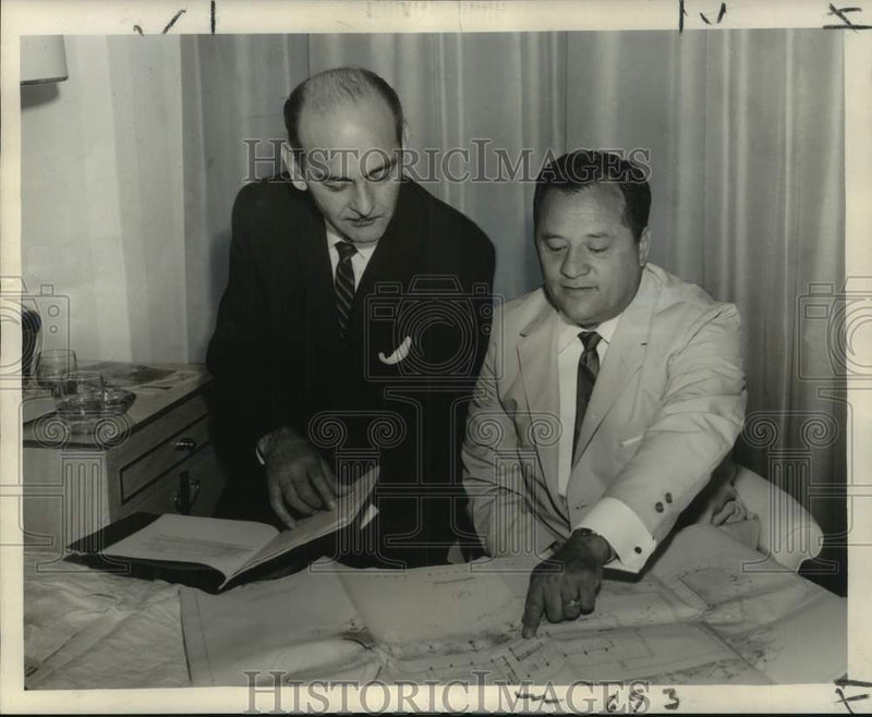 Load image into Gallery viewer, 1962 Press Photo Roberto Bianchi &amp; Juan Sencial of Guatemala Review Tourism Plan
