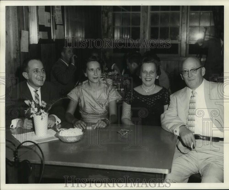 Load image into Gallery viewer, 1957 Press Photo Mr. &amp; Mrs. Schonberg and friends shown at restaurant
