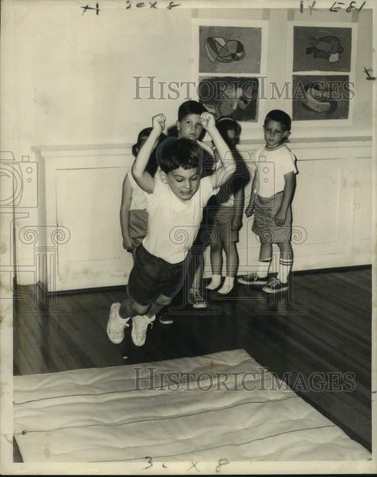 1962 Press Photo Lusher youngster Boyce Green makes healthy jump - noc40230- Historic Images
