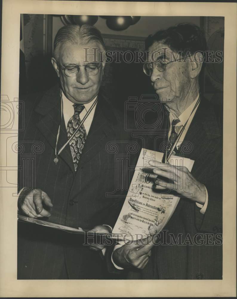 Load image into Gallery viewer, 1947 Press Photo Charles Wolverton and Adriano Vilanova in New Orleans Ceremony
