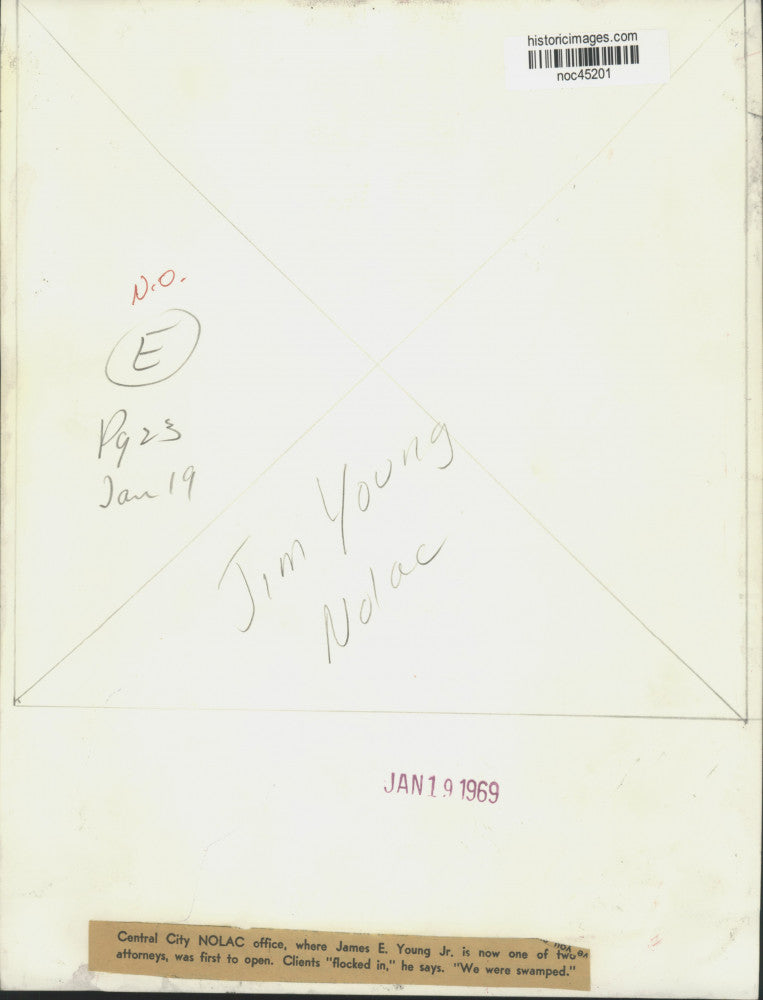 Load image into Gallery viewer, 1969 Press Photo Attorney James E. Young Jr., New Orleans Legal Assistance
