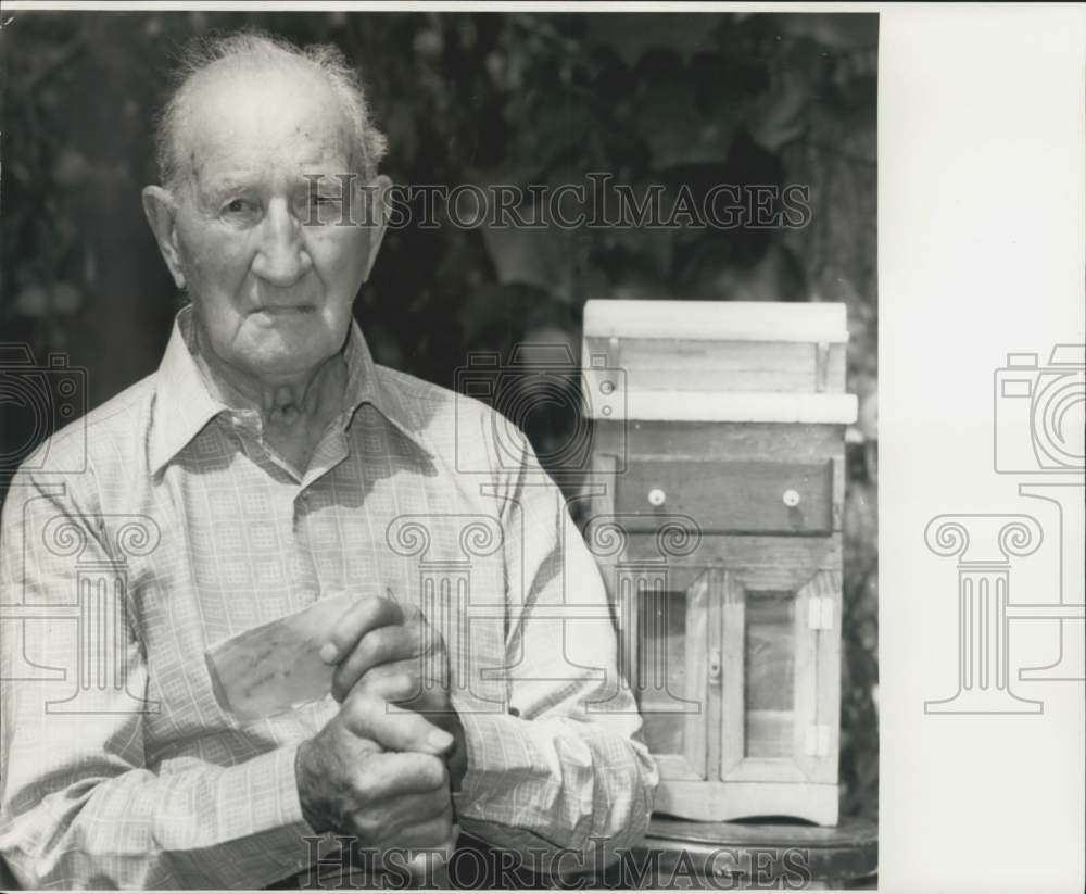 1974 Press Photo Yurutich sanding high chair, marble topped washstand at right- Historic Images