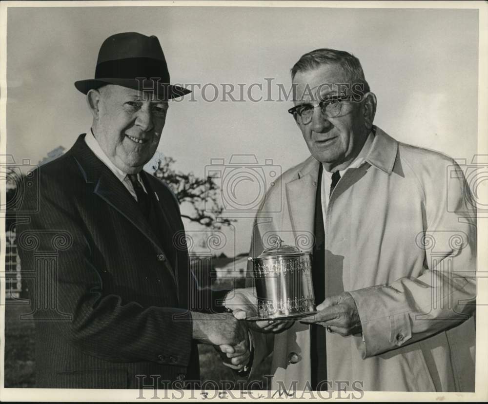 1966 Press Photo Marion Van Berg is presented a trophy by Shelley Schuster- Historic Images