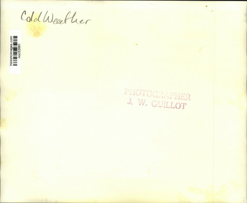 Load image into Gallery viewer, Press Photo Man walks by body of water in cold weather - noc53991

