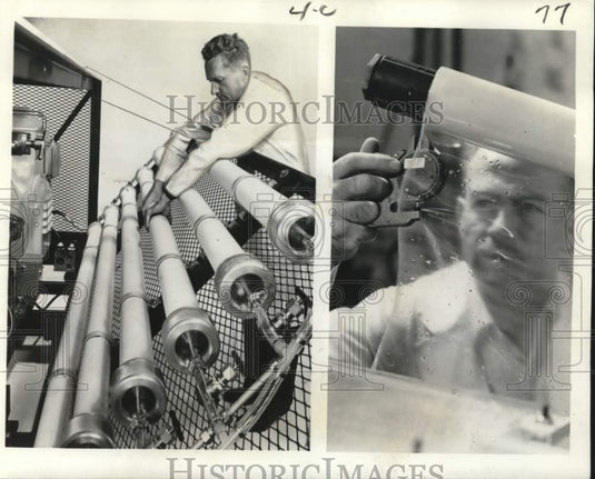 1966 Press Photo Workman checks pressure tubes filled with acetate membranes.