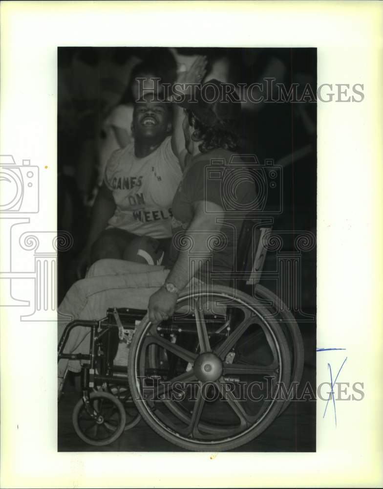 1990 Press Photo Football - Players during wheelchair football game at Higgins- Historic Images